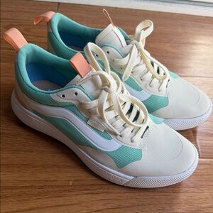 Mint and Cream Sneakers with Orange Accents